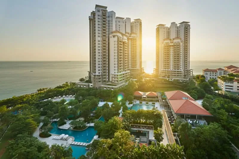 Quayside and Andaman at Quayside towers by the sea at sunset