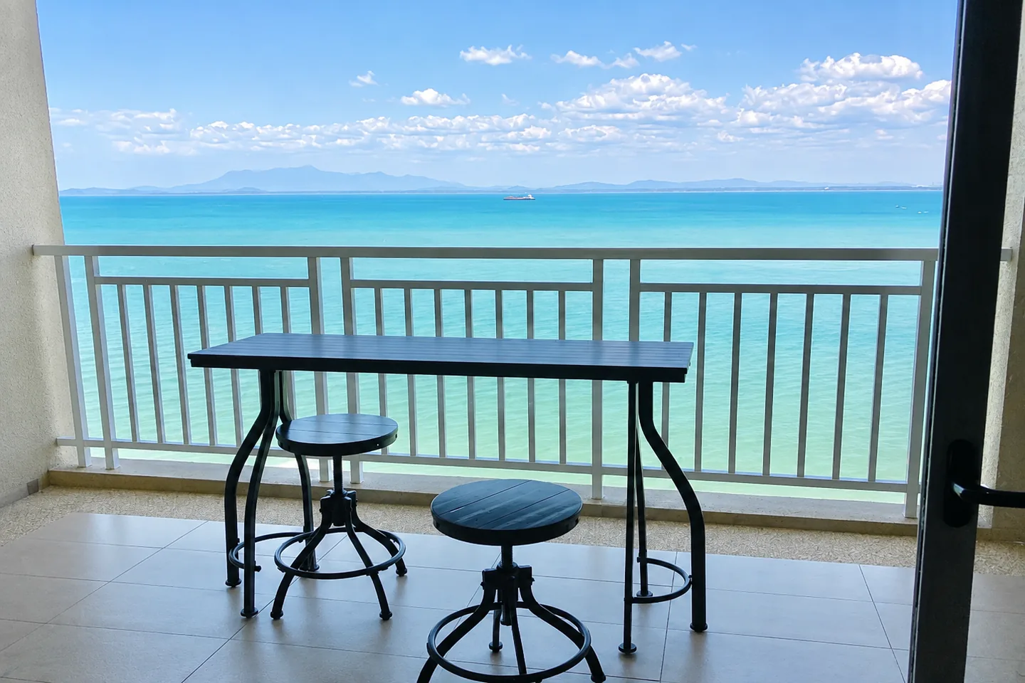 Enhanced actual photograph of a Quayside sea-view balcony
