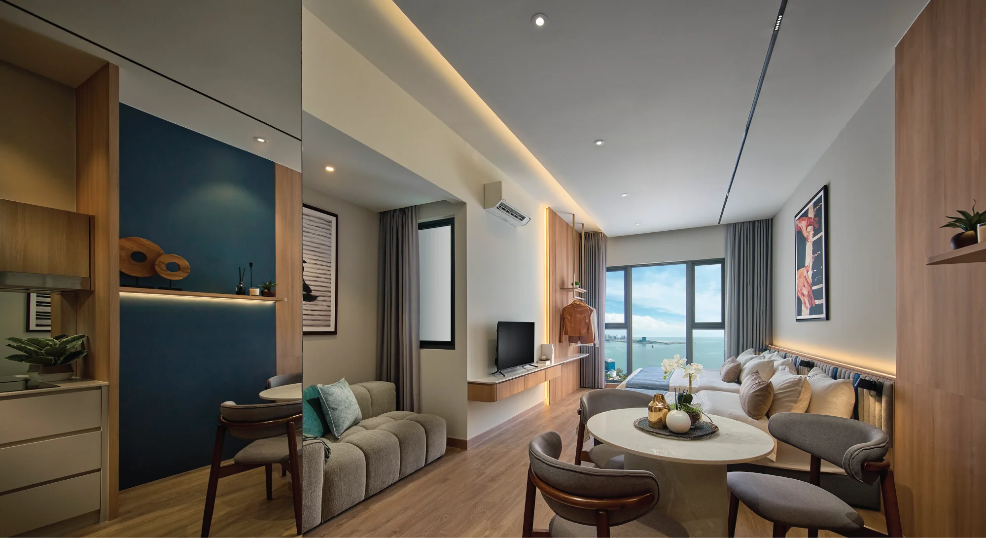 Approved interior illustration with kitchen, living space and window-side sleeping area